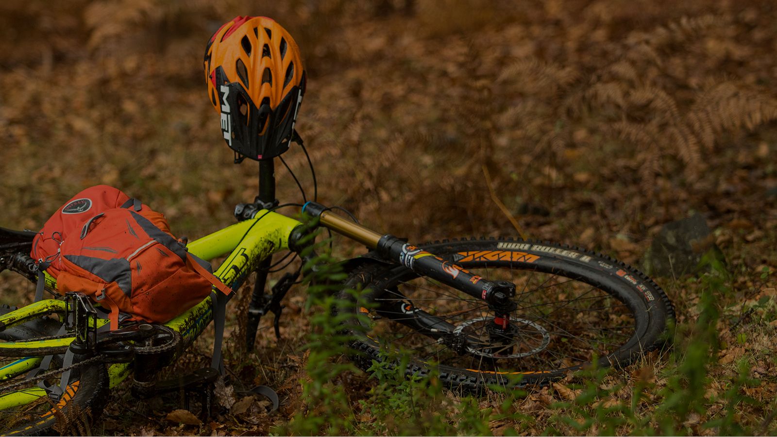 full-suspension-mountain-bike-lying-on-ground.jpeg